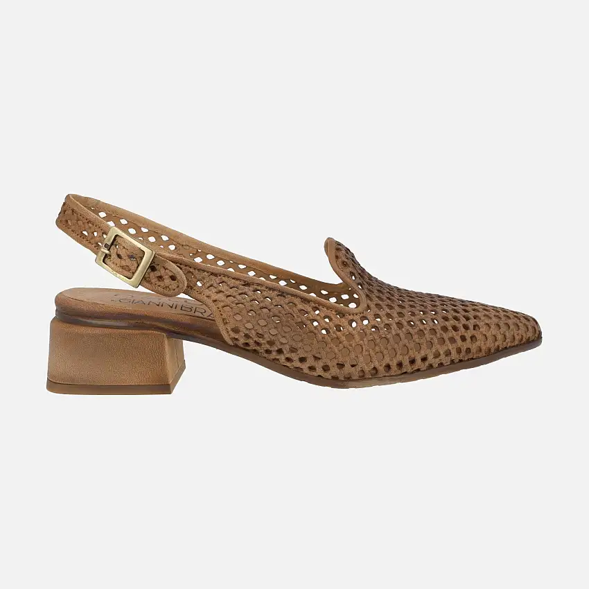 Zapatos trenzados de piel destalonados con copete