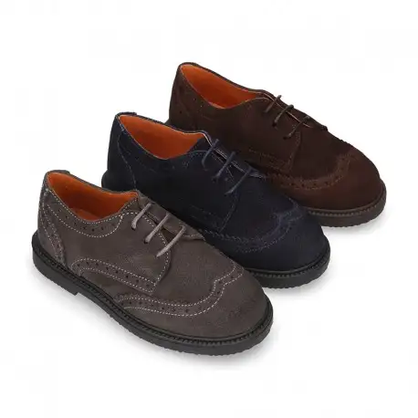 Zapato vestir Niño tipo Blucher con cordones y picados en piel Serraje.