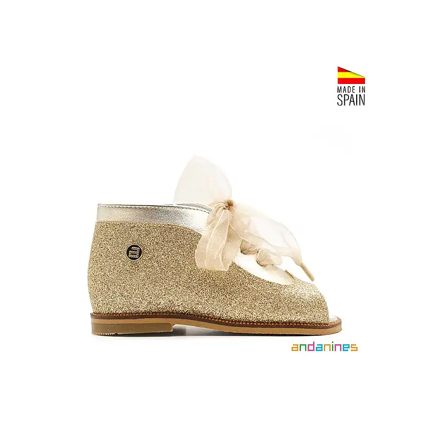 Zapato glitter dorado abotinado