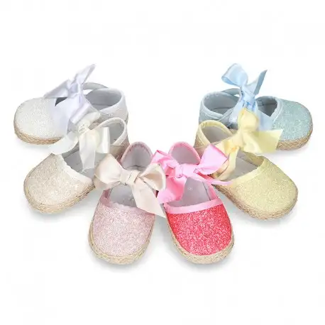 Alpargata BABY con cierre adherente y lazo en piel con GLITTER.